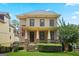 Charming two-story home with a well-manicured lawn and inviting front porch with stone accents at 3451 Fairway Dr, College Park, GA 30337