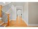Spacious foyer features hardwood floors, staircase and open access to the rest of this beautiful home at 3451 Fairway Dr, College Park, GA 30337