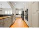 Modern kitchen with stainless steel appliances, granite countertops, and ample cabinet space for storage at 3451 Fairway Dr, College Park, GA 30337
