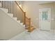 View of staircase with wood railings and white trim at 3451 Fairway Dr, College Park, GA 30337