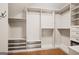 Spacious walk-in closet with custom shelving and ample hanging space at 3451 Fairway Dr, College Park, GA 30337