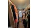 Walk-in closet offers ample storage with organized shelving and hanging space at 301 Leland Ct, Mcdonough, GA 30253