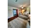 Bright living room with hardwood floors, modern decor, and a comfortable sofa at 301 Leland Ct, Mcdonough, GA 30253