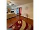 Cozy living room featuring hardwood floors, fireplace, and decorative accents at 301 Leland Ct, Mcdonough, GA 30253
