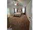 Spacious main bedroom with vaulted ceiling, ceiling fan, and neutral color palette at 301 Leland Ct, Mcdonough, GA 30253