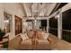 Cozy back porch with comfortable seating, ideal for enjoying peaceful evenings outdoors at 654 Cannon Rd, Sharpsburg, GA 30277