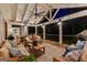 Comfortable back porch living area perfect for relaxing with Gathering and friends at 654 Cannon Rd, Sharpsburg, GA 30277