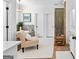 Bright bathroom with a soaking tub, tiled shower, and elegant fixtures at 654 Cannon Rd, Sharpsburg, GA 30277