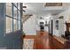 Inviting foyer with hardwood floors and an open view of the staircase and kitchen at 654 Cannon Rd, Sharpsburg, GA 30277