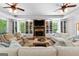 Inviting living room features custom bookshelves, fireplace, and comfortable seating at 654 Cannon Rd, Sharpsburg, GA 30277