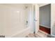 Bright bathroom with modern fixtures and a clean, white shower and tub combination at 70 Sylvia Cir, Covington, GA 30016