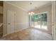 Bright breakfast area with a large window overlooking the deck at 70 Sylvia Cir, Covington, GA 30016