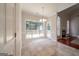 Sunlit breakfast area with access to the deck and adjacent to the living area at 70 Sylvia Cir, Covington, GA 30016