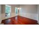 Formal dining room boasts natural light, beautiful moldings, and hardwood floors at 70 Sylvia Cir, Covington, GA 30016