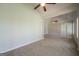 Large main bedroom with trey ceiling, fan and plush carpet at 70 Sylvia Cir, Covington, GA 30016