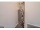 Hot water heater against a light gray wall at 70 Sylvia Cir, Covington, GA 30016