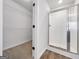 Main bathroom features a walk in shower and walk in closet at 789 Galveston Way, Mcdonough, GA 30253