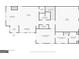 A floor plan displaying the layout of the first level of a home, including rooms like kitchen, living room, and primary bedroom at 185 Central Ave, Fayetteville, GA 30214