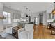Well-designed open concept living with kitchen, dining area, and living room featuring modern decor at 185 Central Ave, Fayetteville, GA 30214