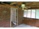 Sunroom with a ceiling fan and natural light at 8469 Shiloh Ct, Jonesboro, GA 30238