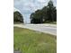 A road with signage next to wooded area at 1810 Highway 138 E, Stockbridge, GA 30281