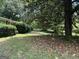 Yard with shade trees and ground cover at 1810 Highway 138 E, Stockbridge, GA 30281