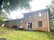 Brick home featuring a lawn and sliding glass doors at 4196 Lehigh Blvd, Decatur, GA 30034