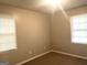 Neutral bedroom with two windows and carpet at 4196 Lehigh Blvd, Decatur, GA 30034