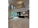 Bright and spacious living room with soaring ceilings and a view of the modern kitchen at 1293 E M Croy Rd, Sugar Hill, GA 30518