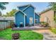 Spacious backyard with a wooden deck, outdoor seating, a grill, and a fire pit at 638 Mcgruder Ne St, Atlanta, GA 30312