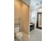 Elegant powder room features decorative floor tiles, and a stylish chandelier at 638 Mcgruder Ne St, Atlanta, GA 30312