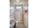 Bathroom showcasing subway tiles, beadboard walls, and a patterned tile floor at 638 Mcgruder Ne St, Atlanta, GA 30312