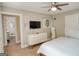 Comfortable bedroom suite boasts ceiling fan and attached bathroom providing convenience and privacy at 638 Mcgruder Ne St, Atlanta, GA 30312