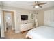 Comfortable bedroom suite boasts ceiling fan and attached bathroom providing convenience and privacy at 638 Mcgruder Ne St, Atlanta, GA 30312