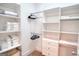 Walk-in closet with ample shelving and storage space for an organized wardrobe and personal items at 638 Mcgruder Ne St, Atlanta, GA 30312
