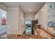 Kitchen with granite countertops, stainless steel appliances, and open access to the living area at 638 Mcgruder Ne St, Atlanta, GA 30312