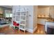 Open floor plan features a kitchen view with a built-in shelving unit at 638 Mcgruder Ne St, Atlanta, GA 30312