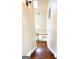 A stairway descends, illuminated by a skylight and leads to a landing at 638 Mcgruder Ne St, Atlanta, GA 30312