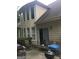 Home exterior showcasing a patio area with outdoor seating and a large window at 1697 Preserve Park Dr, Loganville, GA 30052