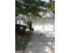 Charming home featuring a stone facade, a two-car garage, and a well-manicured lawn at 1697 Preserve Park Dr, Loganville, GA 30052