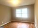 Bedroom featuring hardwood floors and natural light at 345 Fond Du Lac Dr, Stone Mountain, GA 30088