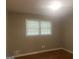 Bright bedroom with hardwood floors and neutral walls at 345 Fond Du Lac Dr, Stone Mountain, GA 30088