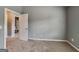 Bedroom featuring neutral carpet and an open door to an adjacent room at 3507 Hideaway Ln, Loganville, GA 30052
