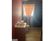 Bathroom with colored walls and a retro vanity at 341 Boxwood St, Social Circle, GA 30025