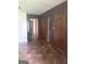 Kitchen showcasing a retro design, wood paneling and unique flooring at 341 Boxwood St, Social Circle, GA 30025