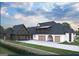 Beautiful new construction with a gray roof and a three-car garage at 0 Ebenezer Rd # 4, Fayetteville, GA 30215