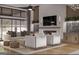 Spacious living room with fireplace, TV, and luxury furniture at 0 Ebenezer Rd # 4, Fayetteville, GA 30215