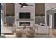 Inviting living room with fireplace, TV, and designer furniture at 0 Ebenezer Rd # 4, Fayetteville, GA 30215