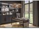 Sophisticated home office with custom built-ins, a large desk, and a view of the yard at 0 Ebenezer Rd # 4, Fayetteville, GA 30215