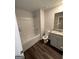 Bathroom with shower, granite vanity, and vinyl floors at 116 Deer Xing, Temple, GA 30179